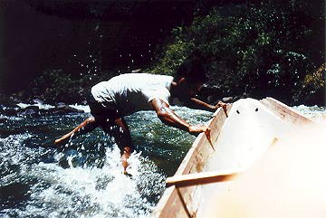 Mighty boatman struggle with the rapids.