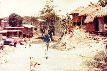 Tony Dravis walks through Igorot Village in Baguio.